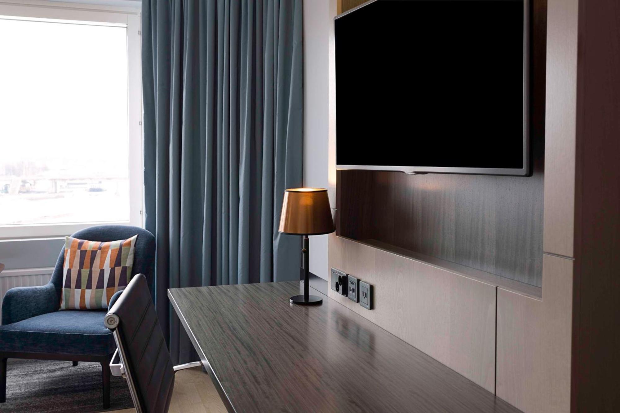 Hilton Helsinki Strand Kültér fotó A television in a hotel room